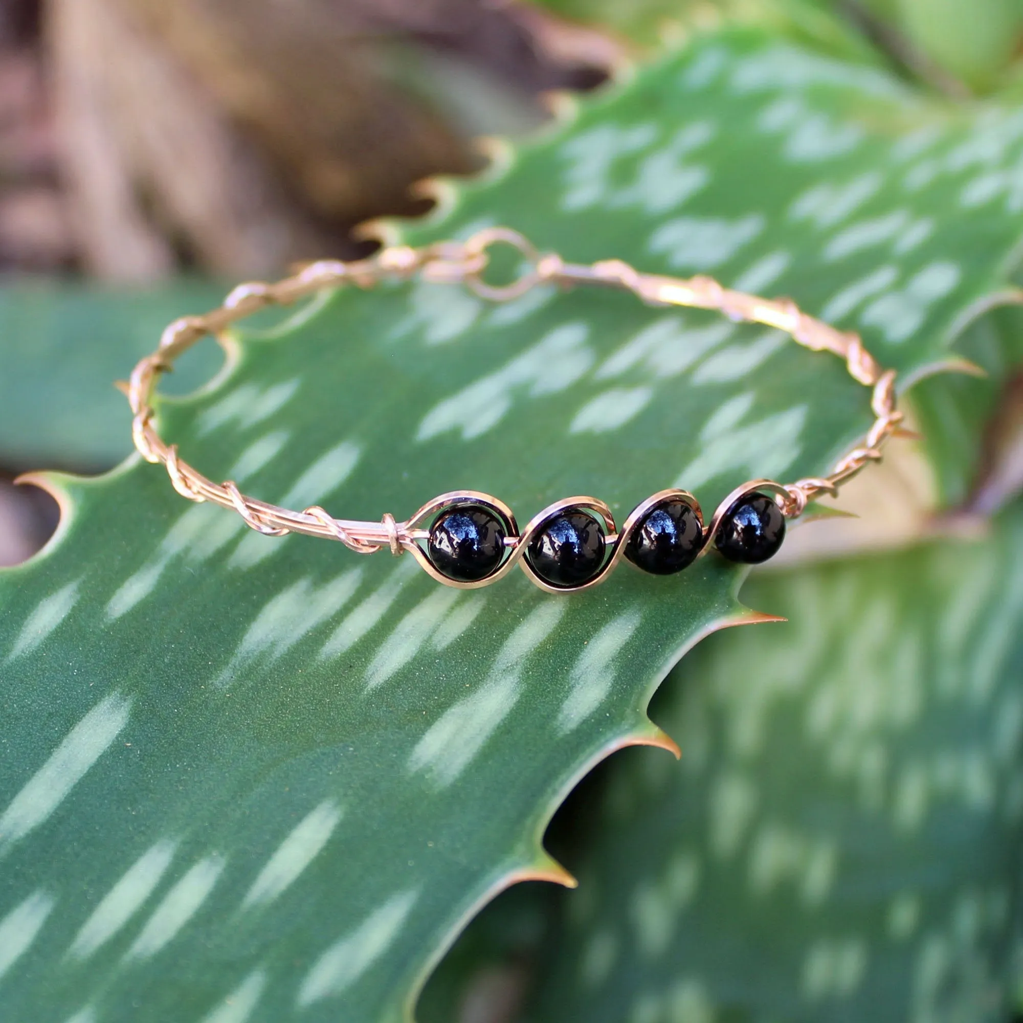 4-Bead Outline Black Onyx Beads Rose Gold Filled Wire Wrapped Bracelet